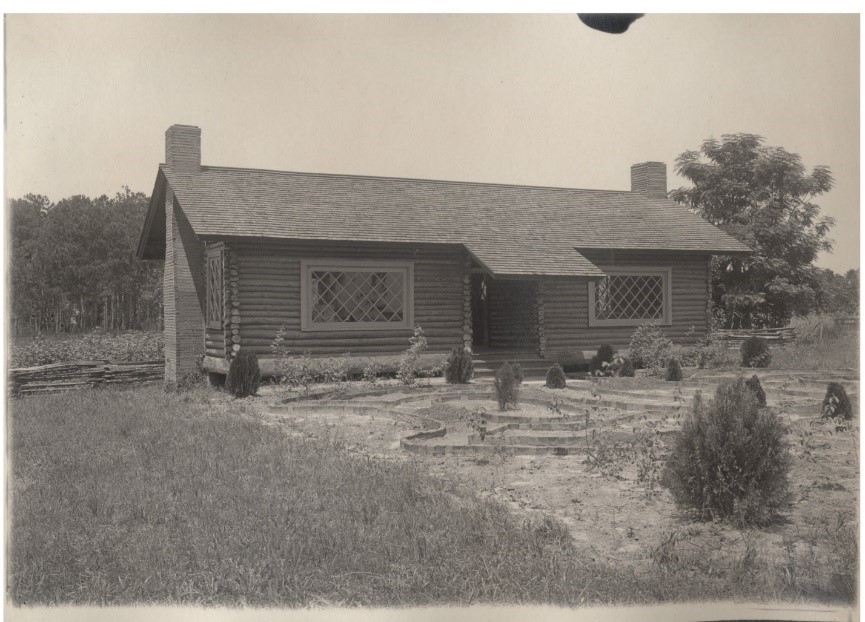 Caption: Log Cabin in 1903
